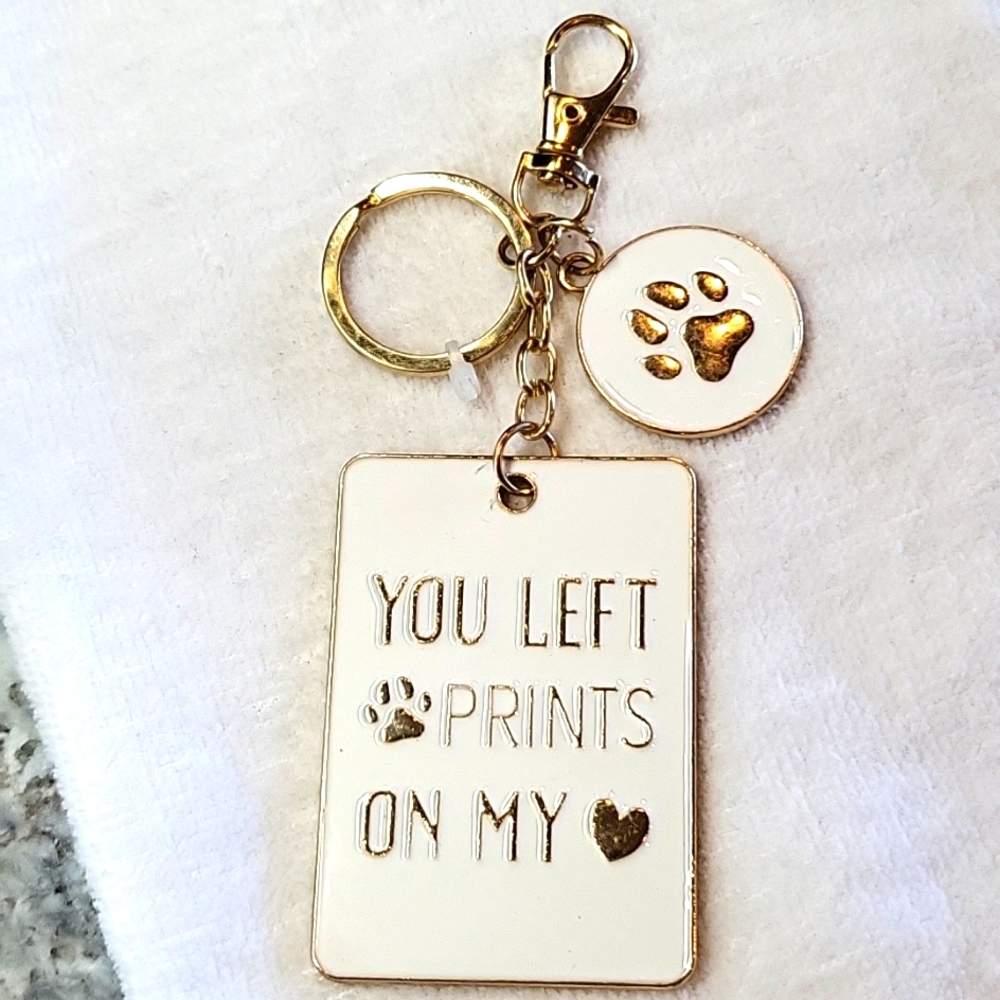 **SOLD***CLOSING 5/18* Paw prints key chain.